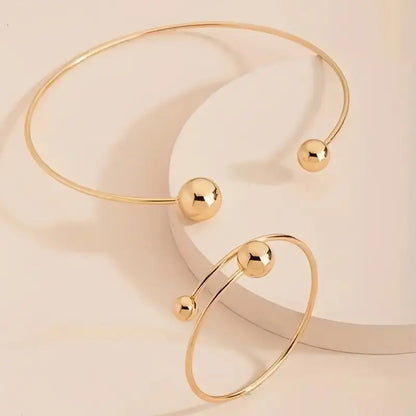 Minimalistiskt Glow-set med halsband och armring | Guld