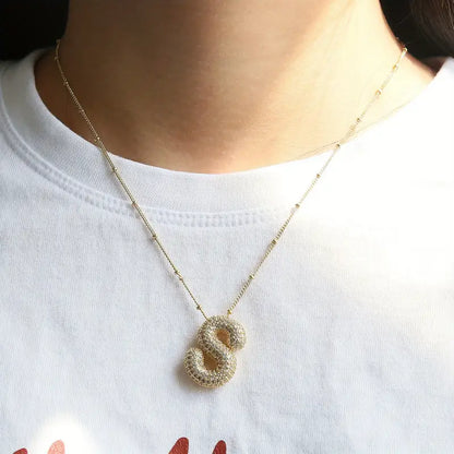 Halsbandsset med initial i bubbelbokstäver | Guld