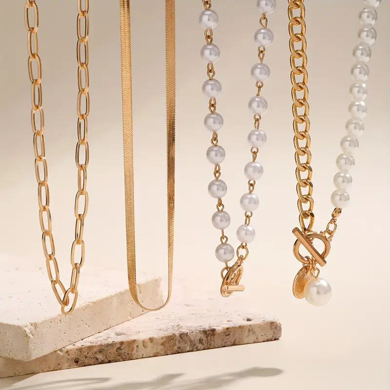 Vintage halsbandsset med pärla och ormlänk i guld | Guld