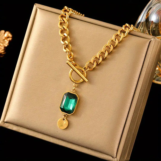 Halsband med smaragd-hänge och kraftig kedja | Guld