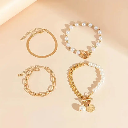 Chic guldarmbandsset i 4 delar – orm, pärlor & länkar | Guld