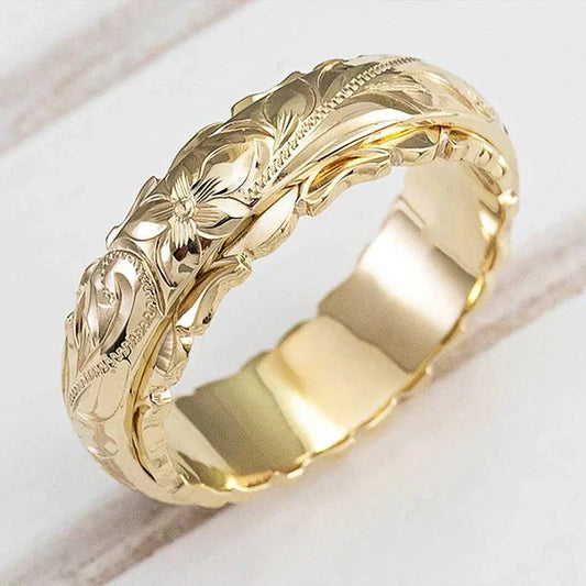 Antik guldring med blomma | Guld