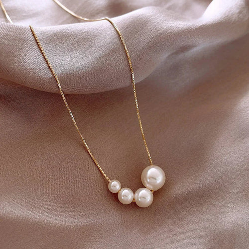 Utsökt pärlhalsband | Guld